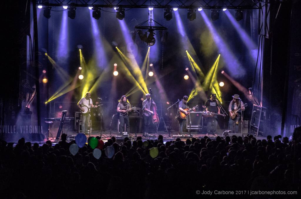Greensky Bluegrass under bright lights on main stage at Rooster Walk