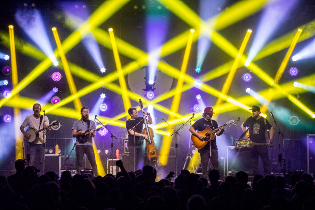 Greensky Bluegrass performs under colored lights at The Festy Experience 2018