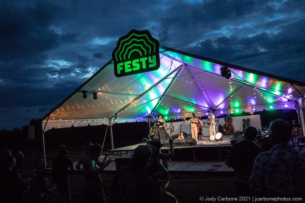 Rising Appalachia performing at dusk The Festy Chisholm VIneyards