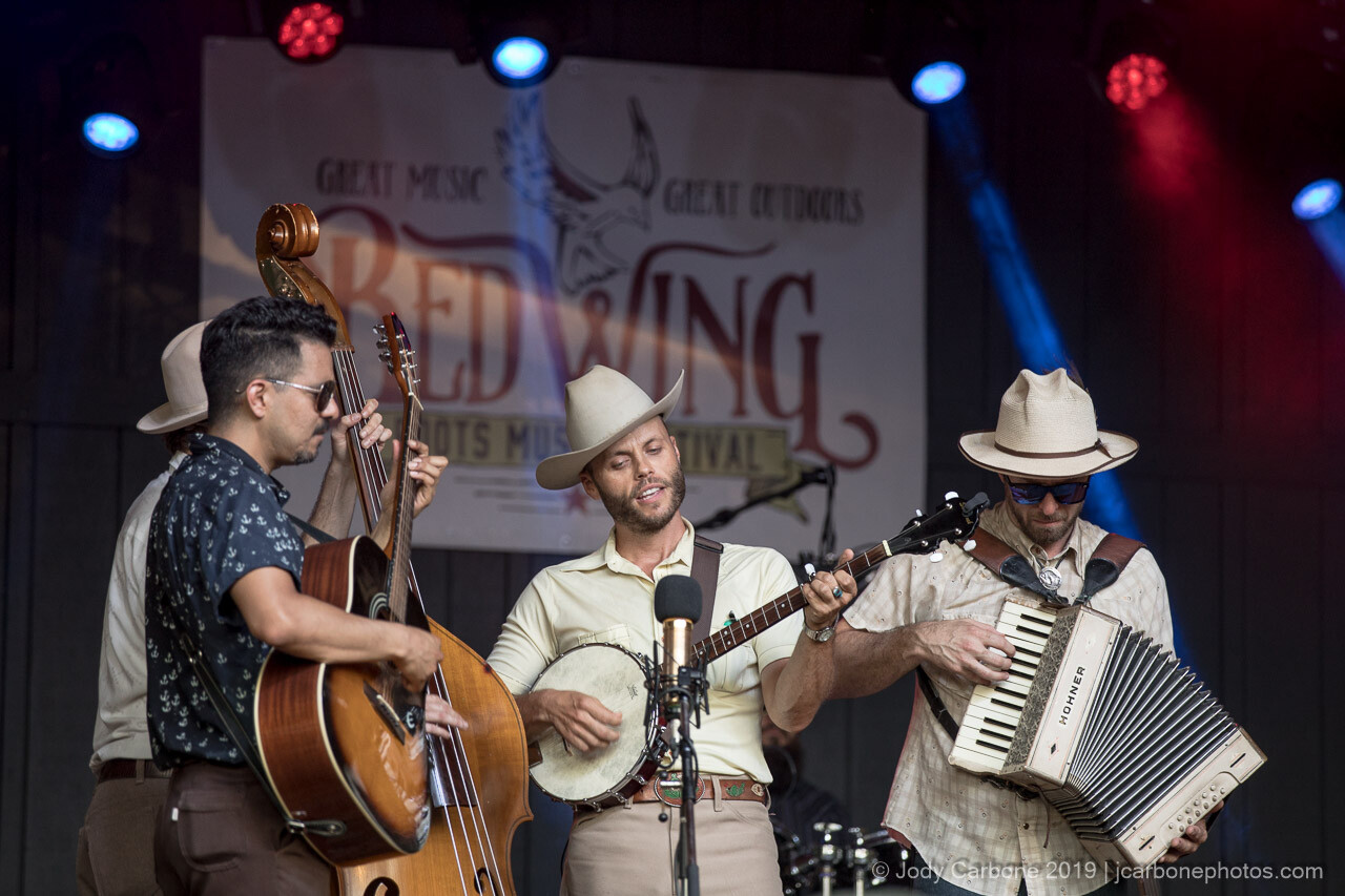Charley Crockett and his band onstage at Red Wing Roots Music Festival