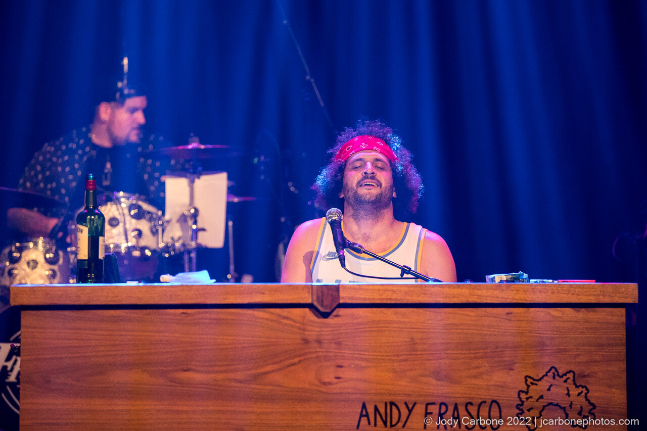 Andy Frasco looking relaxed while playing his piano