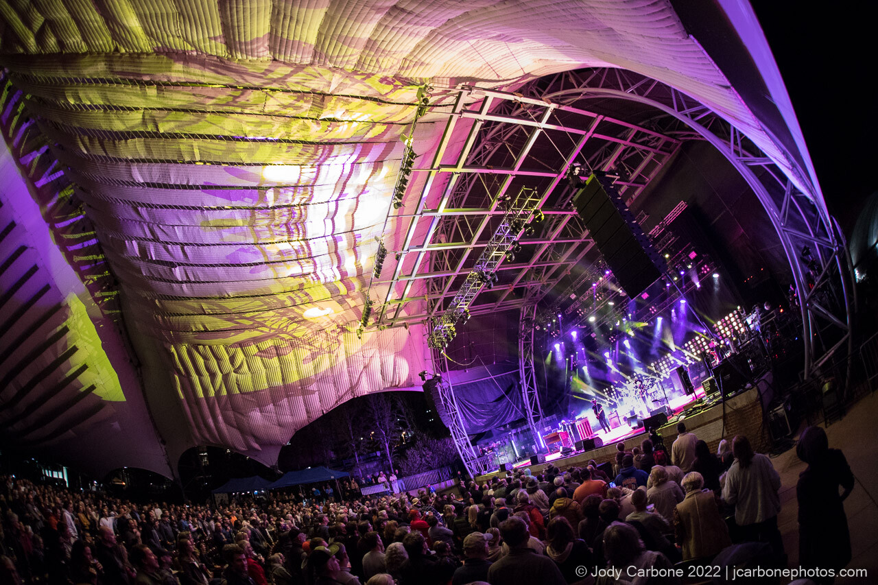 Stage lights paint the pavilion dome with multiple colors with Gary Clark Jr. in concert