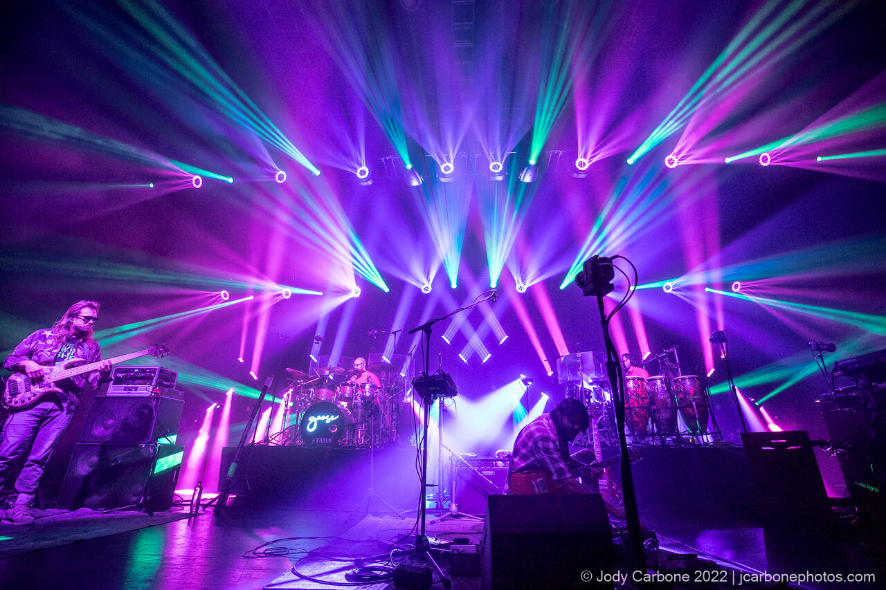 Pretty lights concert photography - Rick plays with guitar effects under pink and green lights